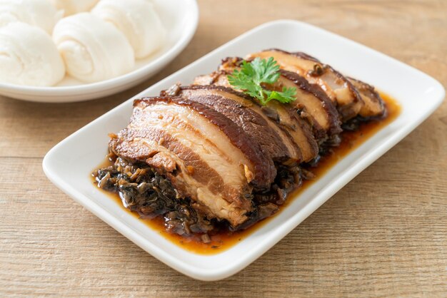 Photo steam belly pork with swatow mustard cubbage recipes or mei cai kou rou