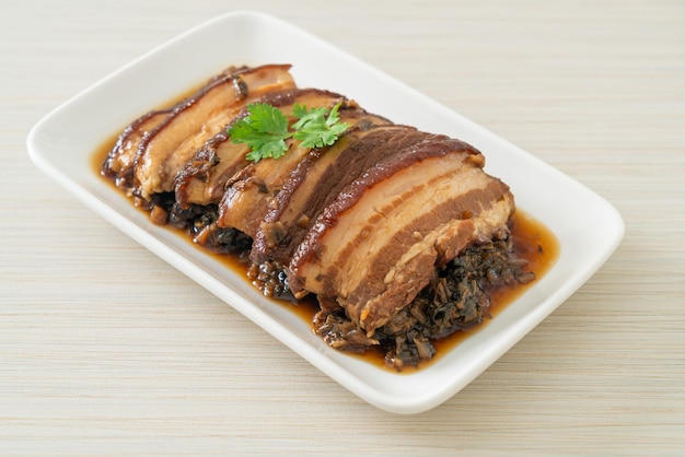 Photo steam belly pork with swatow mustard cubbage recipes or mei cai kou rou
