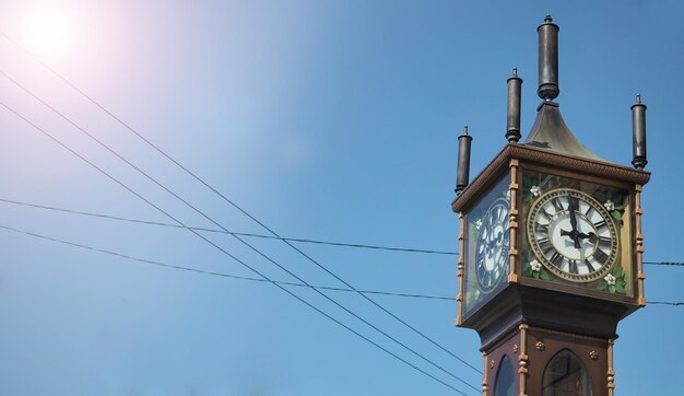 Steam Clock Tower with blue sky background (It's sound every 15 mins. )