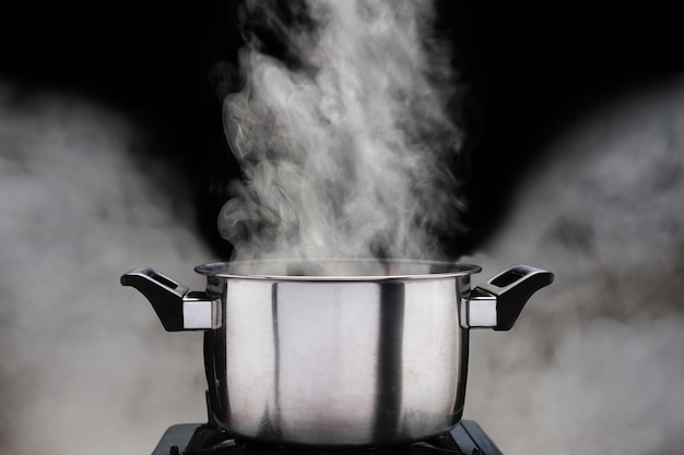 Steam over cooking pot