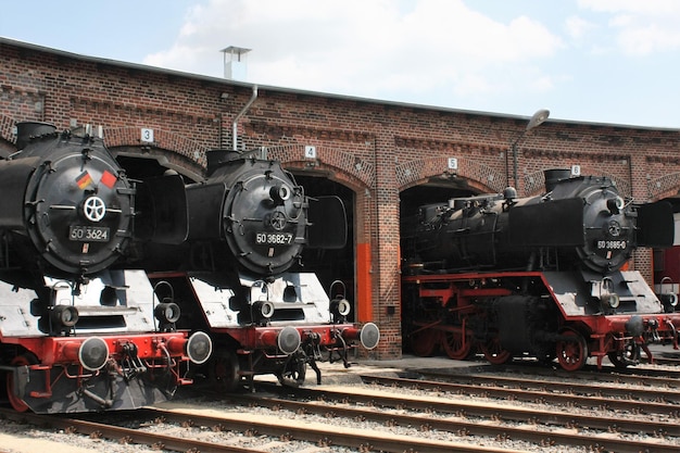 Steam engine trains against the sky