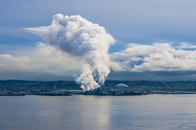 Steam rises from a factory near the port of tacoma