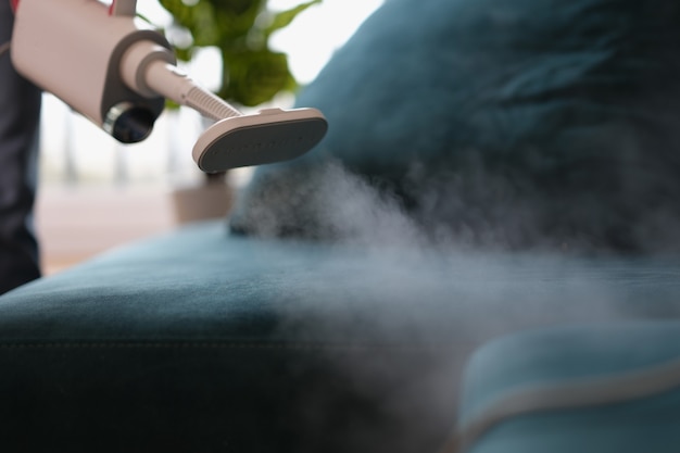 Steam vacuum cleaner for cleaning fabric furniture closeup