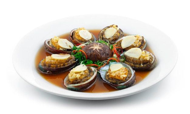 Premium Photo | Steamed abalone with garlic decoration mushroom chinese new  year menu style sideview