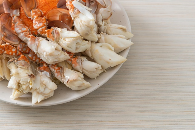 Steamed blue crab with spicy seafood sauce - seafood style