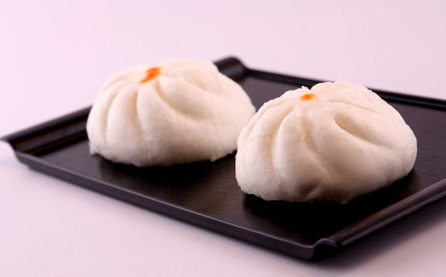 Steamed buns on the wooden floor.