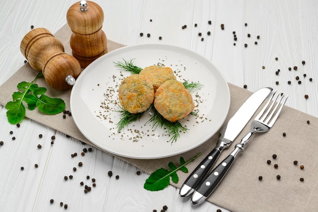 Steamed chicken cutlets with vegetables