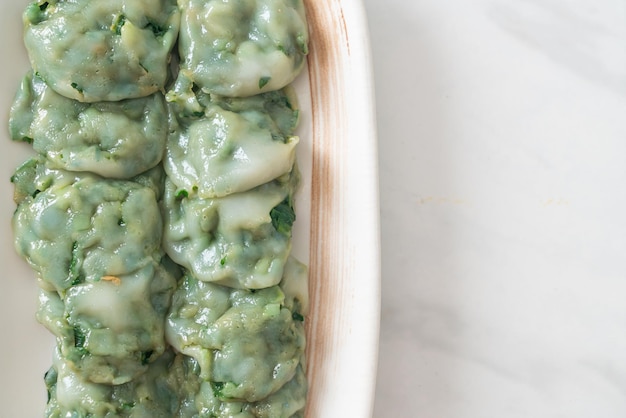 Steamed chives dumplings with sauce