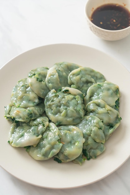 Steamed chives dumplings with sauce