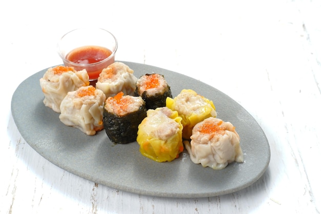 steamed dumpling dimsum with chili dipping sauce