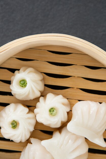 Steamed dumplings in bamboo steamer