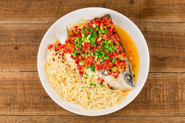 Photo steamed fish head with diced hot red peppers
