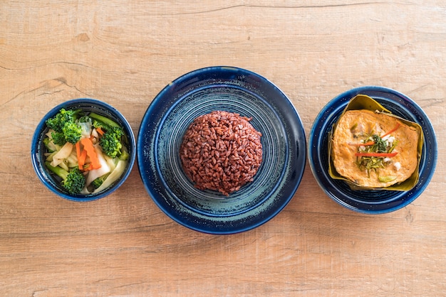 steamed fish with curry paste and berry rice