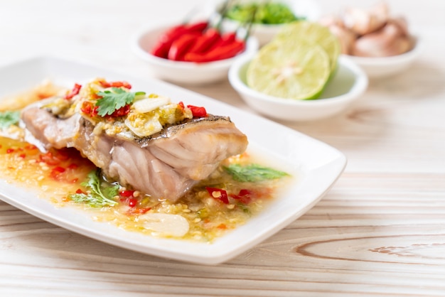 Steamed Grouper Fish Fillet with Chili Lime Sauce in lime dressing