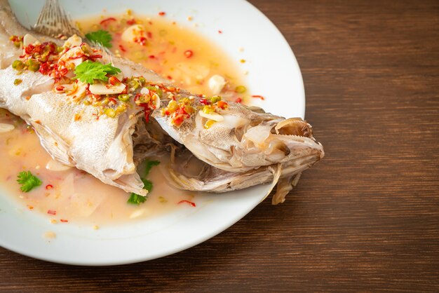 Steamed grouper fish with lime and chillies - Asian food style