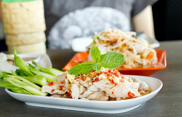 Steamed herbal pork with lime,Thai food style.