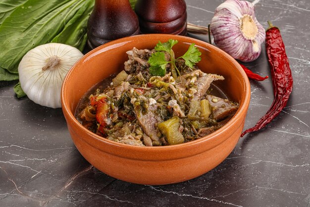 Steamed lamb meat with vegetables and spices