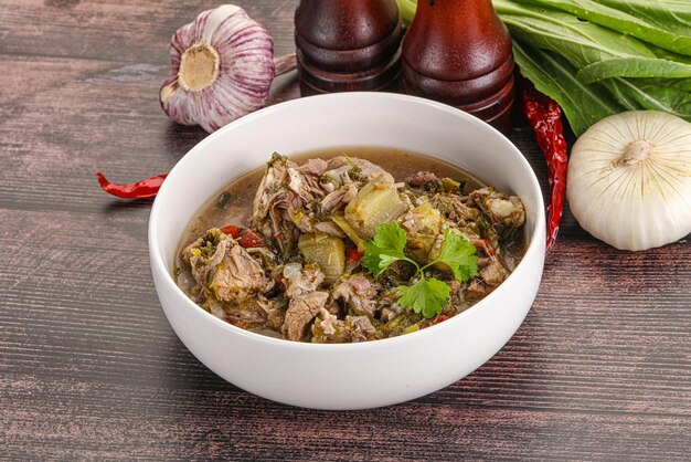 Steamed lamb meat with vegetables and spices