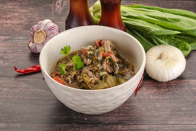 Photo steamed lamb meat with vegetables and spices