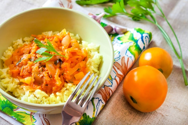 Steamed rice with stewed vegetables and turmeric