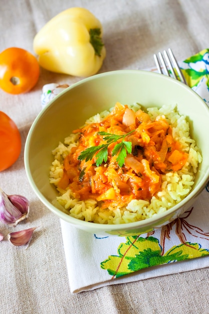 Steamed rice with stewed vegetables and turmeric