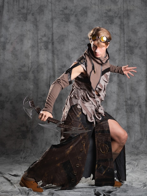 Steampunk or post-apocalyptic style character, with an unusual cold weapon for two hands, a curved blade. A jacket with fastened sleeves with slits and a long leather skirt. a grunge outfit