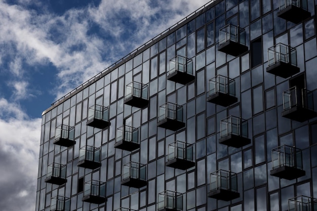 Steel background of glass high rise building