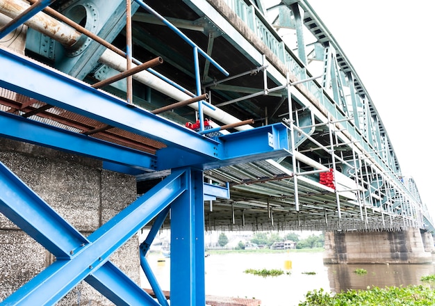 Steel frame scaffolding at the bridge renovation work on the river