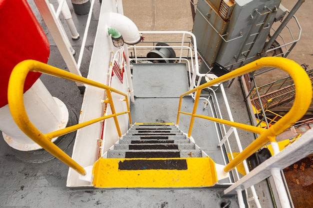 Steel ladder on the ship leading down