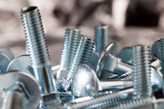 Steel metal bolts for construction and installation work, bolts for screwing nuts