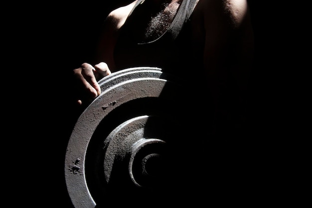 Steel pulley in metal worker hands