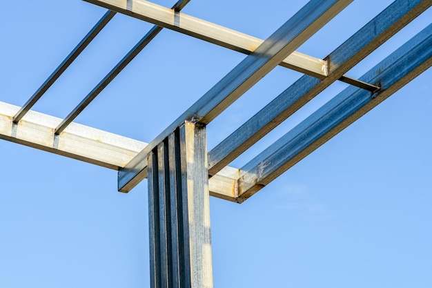 Steel structure house building is under construction on sky background