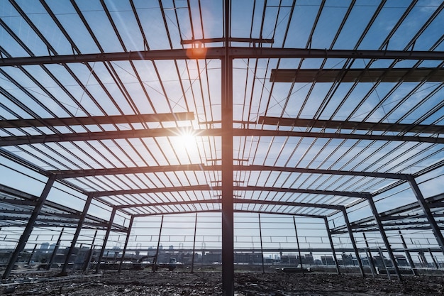 Steel structure workshop closeup steel frame factory buildings in construction