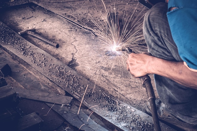 Steel welding of the beam under the truck such skillful
crafting to joint the high strength steel bar picture also shows
leaf spring those specially designed for the truck