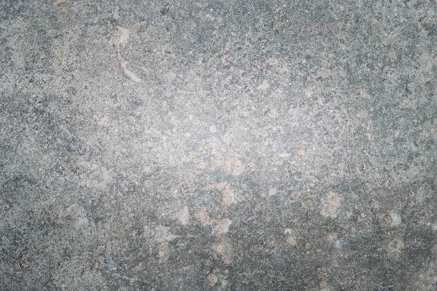 Steenachtige textuur grijs beton bekrast oppervlak