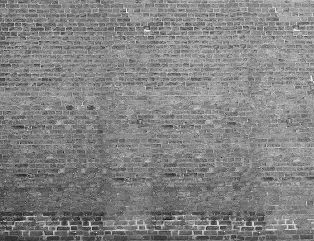 Steenmuur achtergrond in zwart-wit