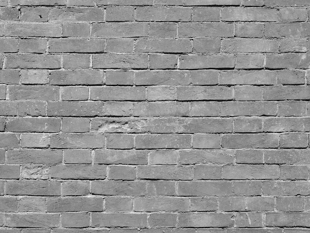 Steenmuur achtergrond in zwart-wit