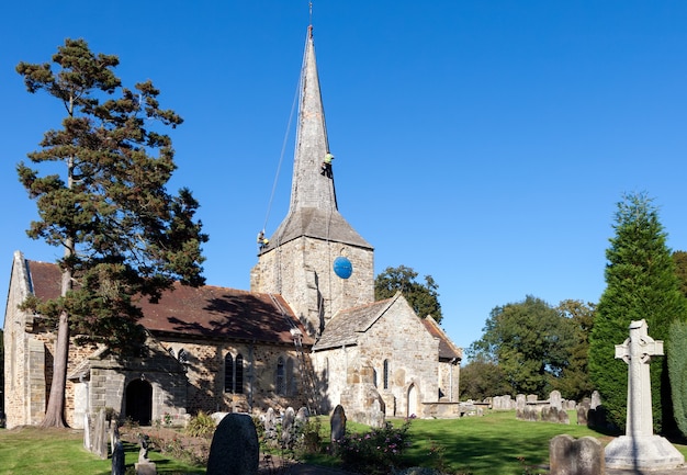 Steeplejacks working on the church roof at Horsted Keynes