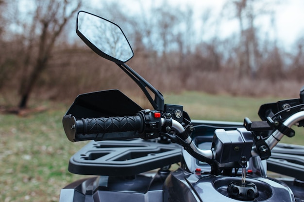 Steering wheel of an ATV. sport and travel concept