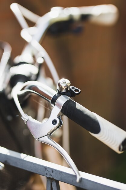 Steering wheel of city bicycle close up photo.