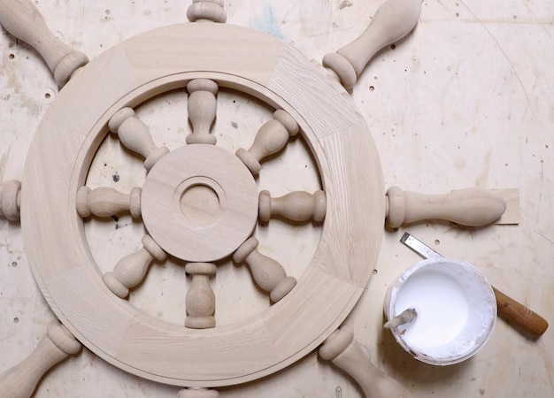 steering wheel for a yacht made of wood in a carpentry workshop