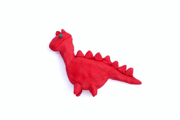 Stegosaurus gemaakt van plasticine op witte achtergrond.