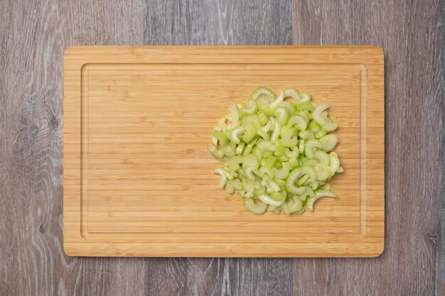 Stems of fresh juicy celery are sliced