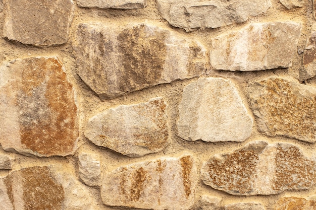 Stenen hek of muur, close-up achtergrondstructuur