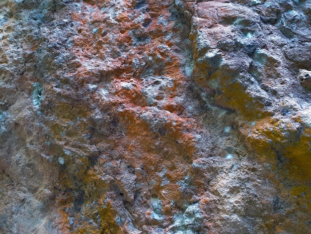 Stenen muur als achtergrond of textuur Een deel van een stenen muur voor achtergrond of textuur