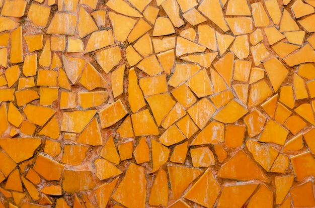 Stenen patroonachtergrond, oranje steen.