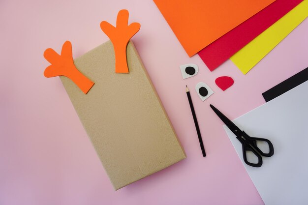 Photo step 2. making a gift package in the form of a christmas deer