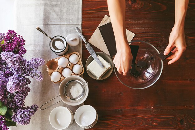 Step by step the chef prepares a dessert - chocolate fondant. Classic recipe.