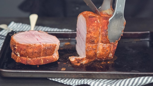 Step by step. Cooked boneless pork roast rubbed with spice rub.