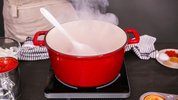 Step by step. Cooking turkey chili in enameled cast iron covered dutch oven.